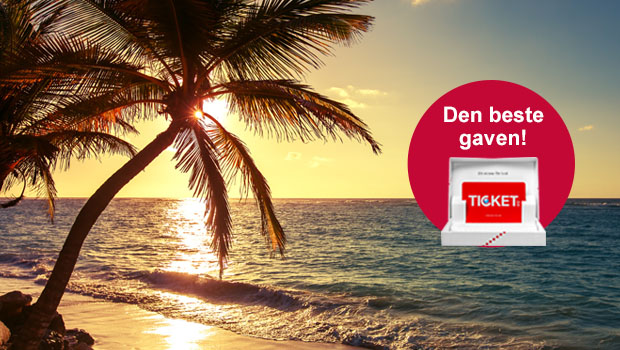 Solnedgång vid strand med palm i förgrunden; cirkel med texten "Den beste gaven!" och ett Ticket-presentkort